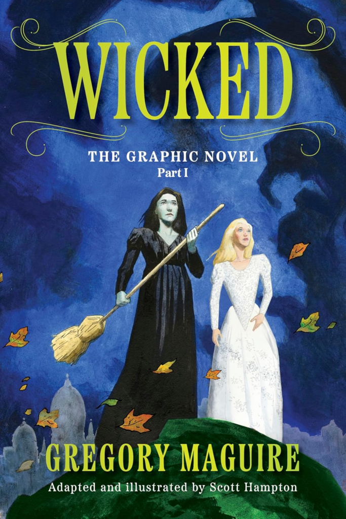 Wicked Graphic Novel Part 1 cover featuring Elphaba dressed in black with her broom and Glinda next to her in white.