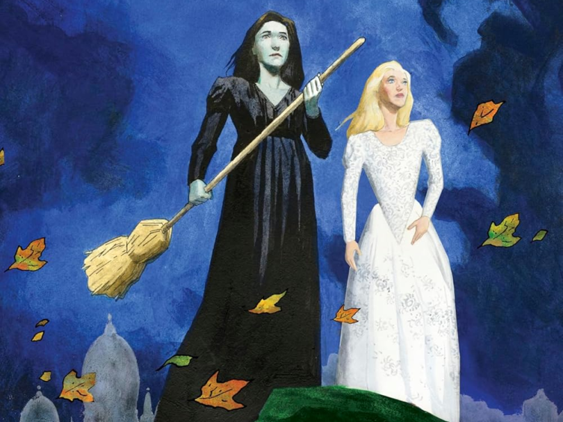 Wicked Graphic Novel Part 1 cover featuring Elphaba dressed in black with her broom and Glinda next to her in white.